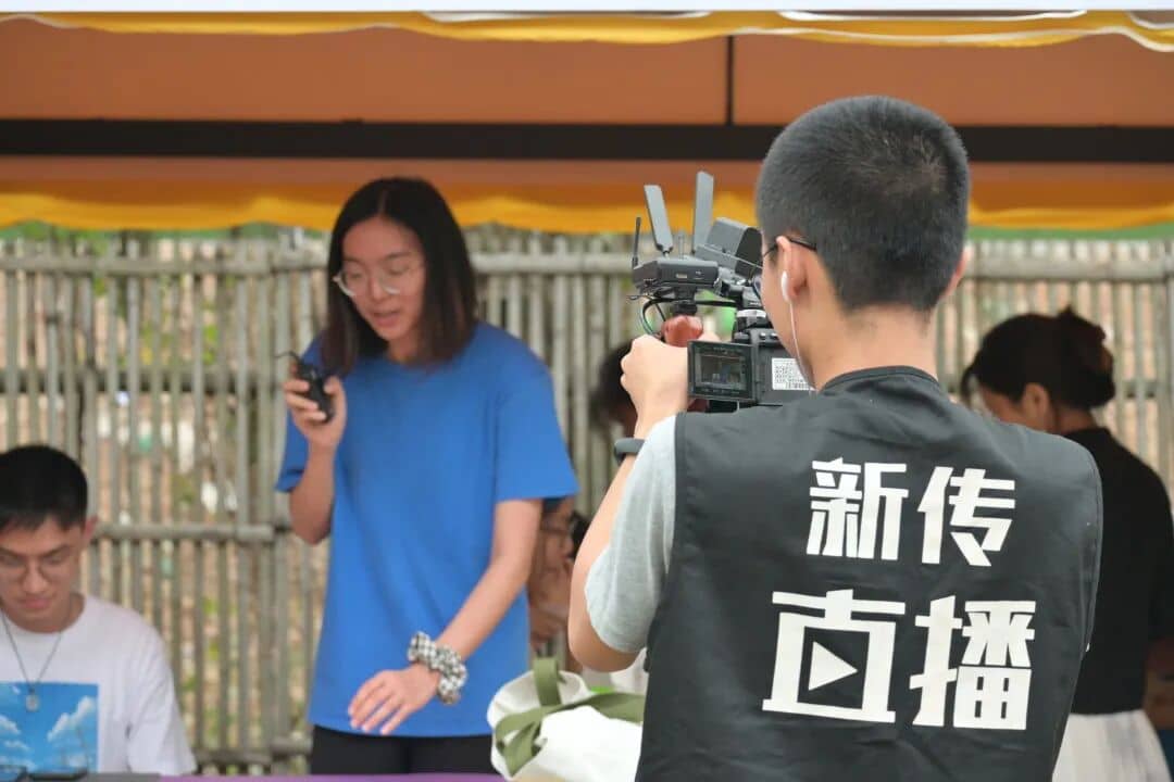 XinChuan Studio filming in the booth area of the Southeast Asian Culture Festival
