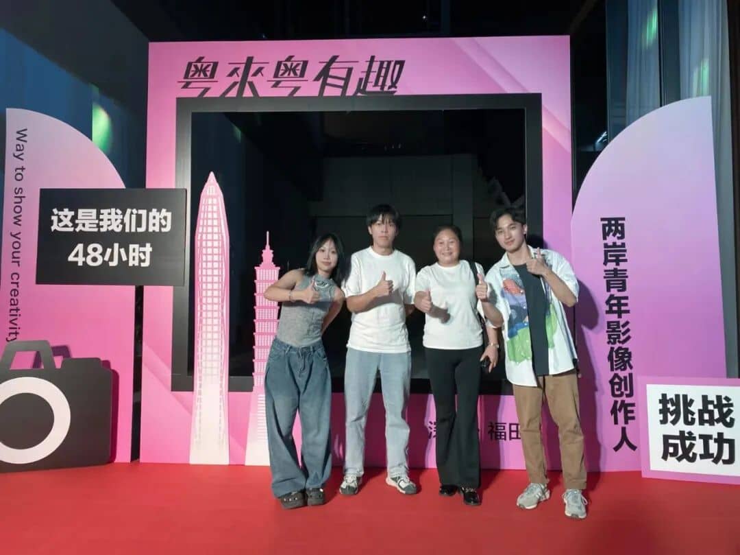 NODARK members posing in front of a 48-hour challenge installation